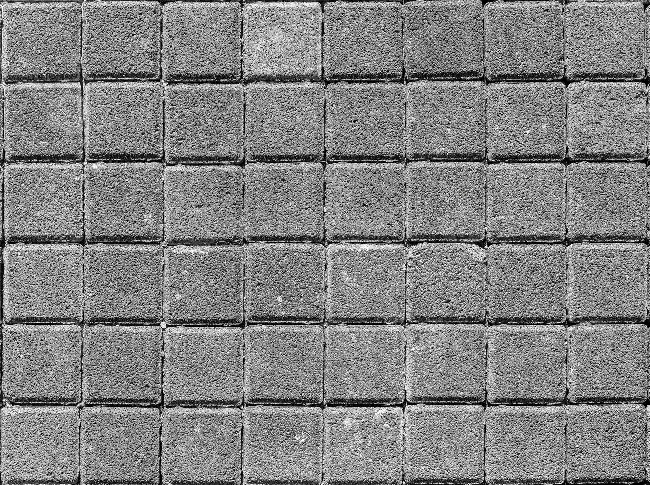 The texture of a stone monotonous pavement. Top view. Abstract background. photo