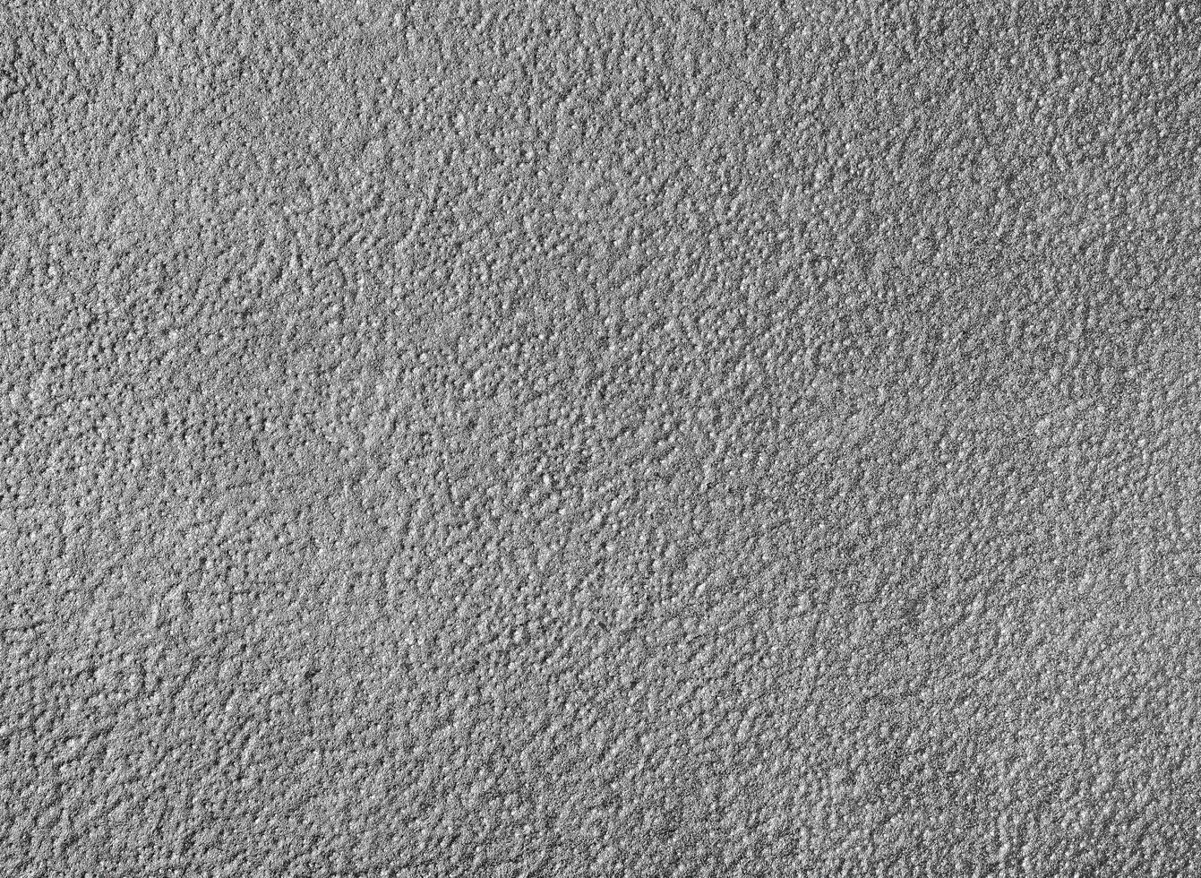 Monochrome texture of shiny grained metal. Abstract background. photo