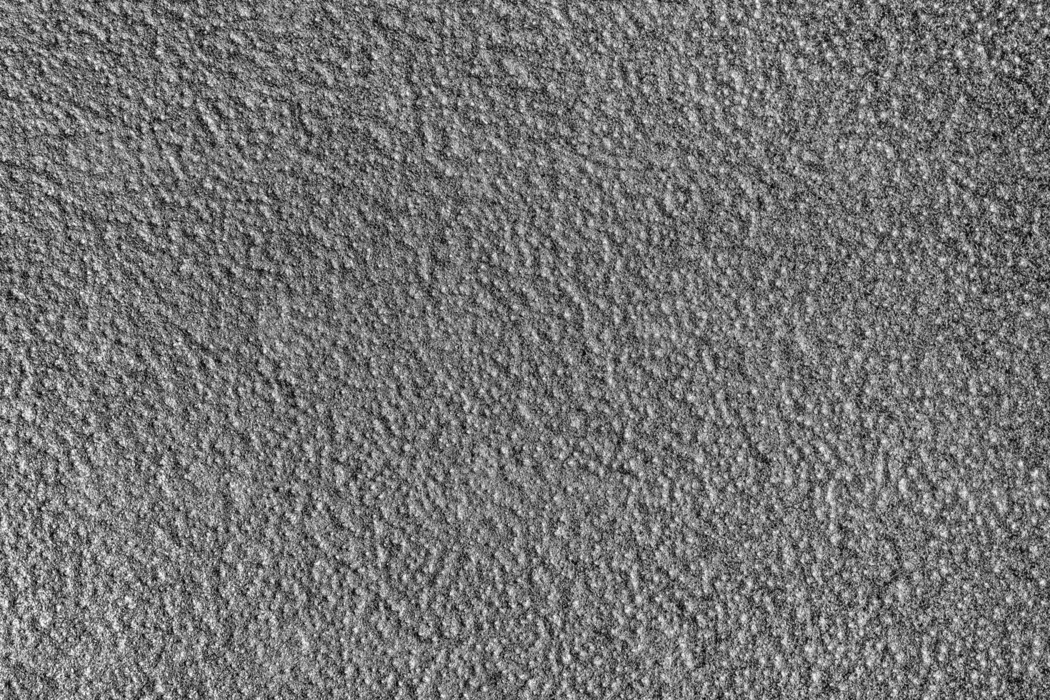 Monochrome texture of shiny grained metal. Abstract background. photo