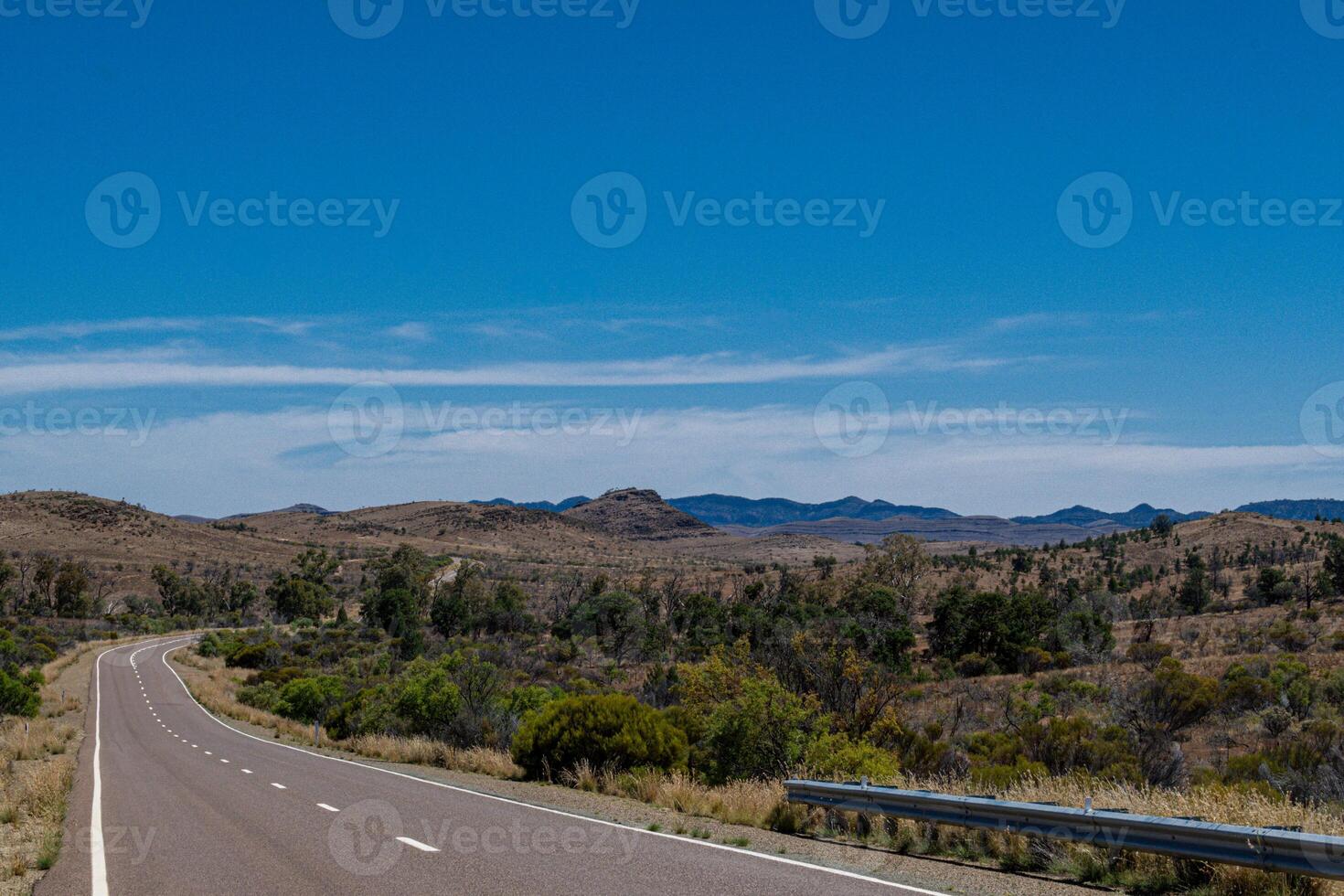 Desert Road Stretching into Distance photo