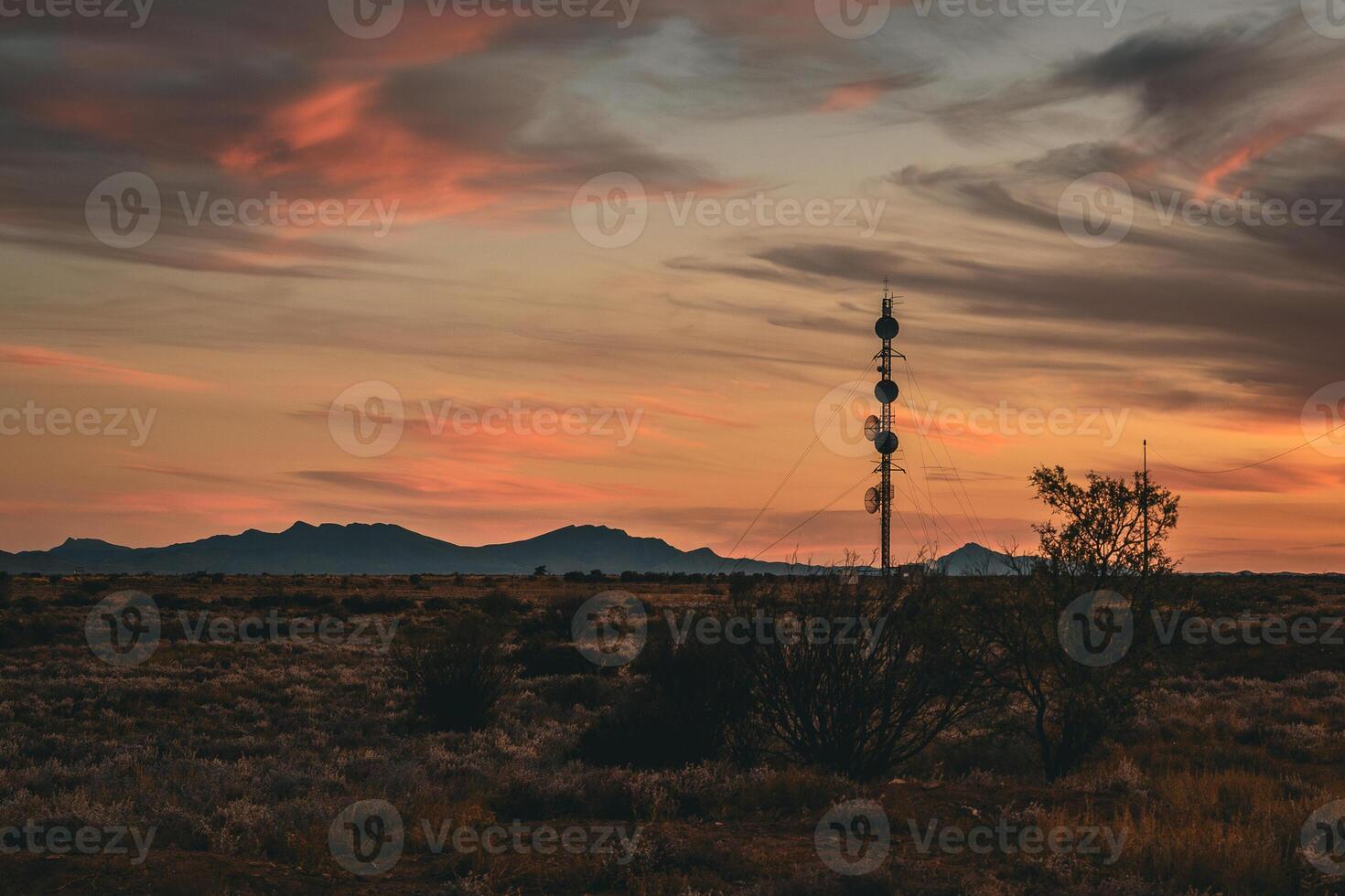 Silhouette of Antennas at Sunset photo
