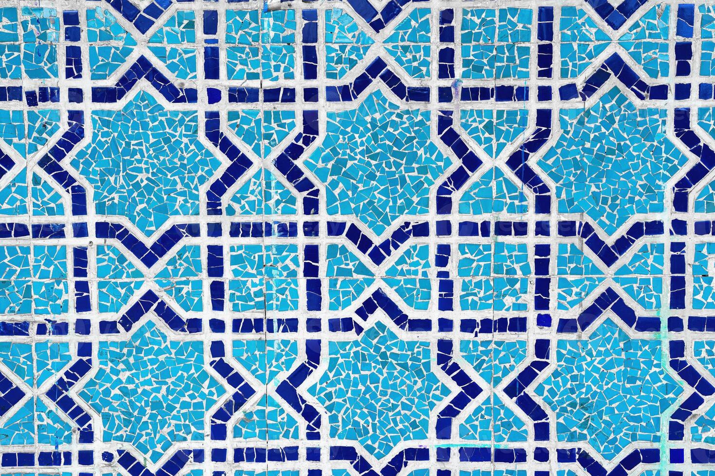 Geometric traditional Islamic ornament. Fragment of a ceramic mosaic. photo