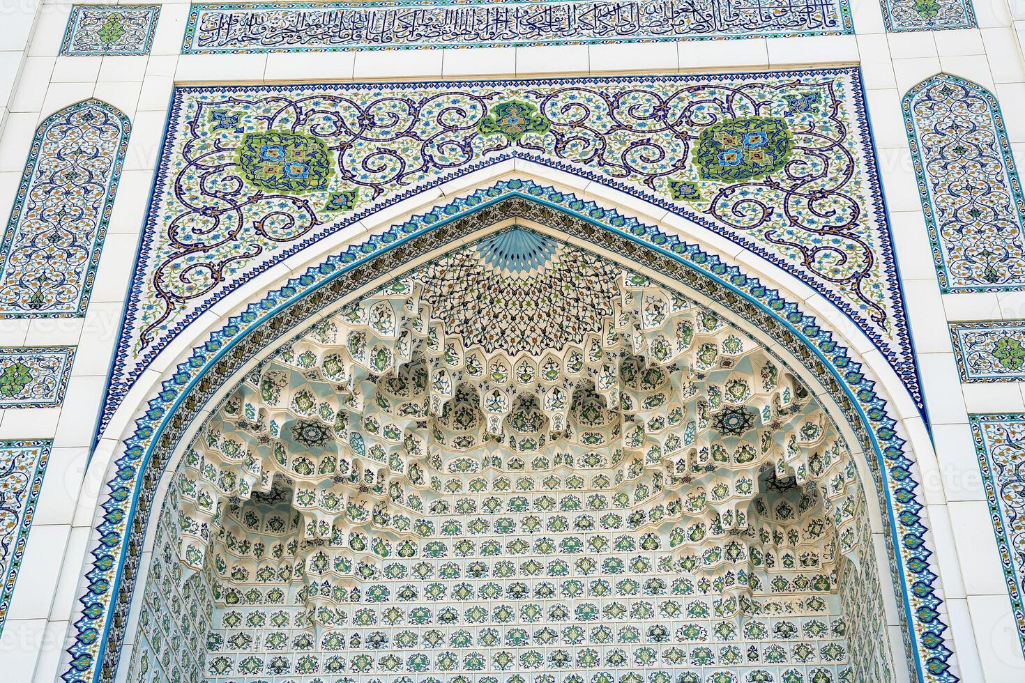 Geometric traditional Islamic ornament. Fragment of a ceramic mosaic. photo