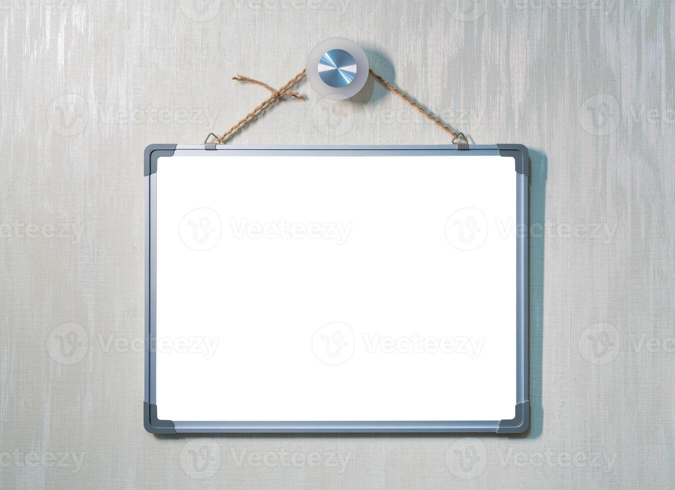 Blackboard, with copy space for text, hanging on a rope on a wall with wallpaper. Mockup for design. photo