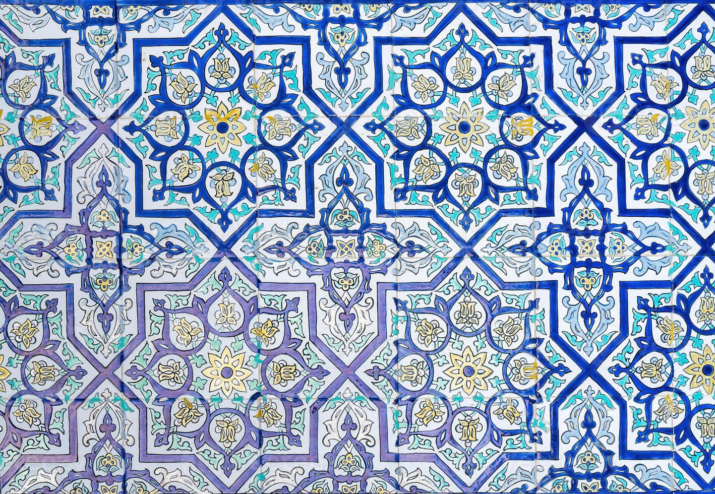 Geometric traditional Islamic ornament. Fragment of a ceramic mosaic. photo