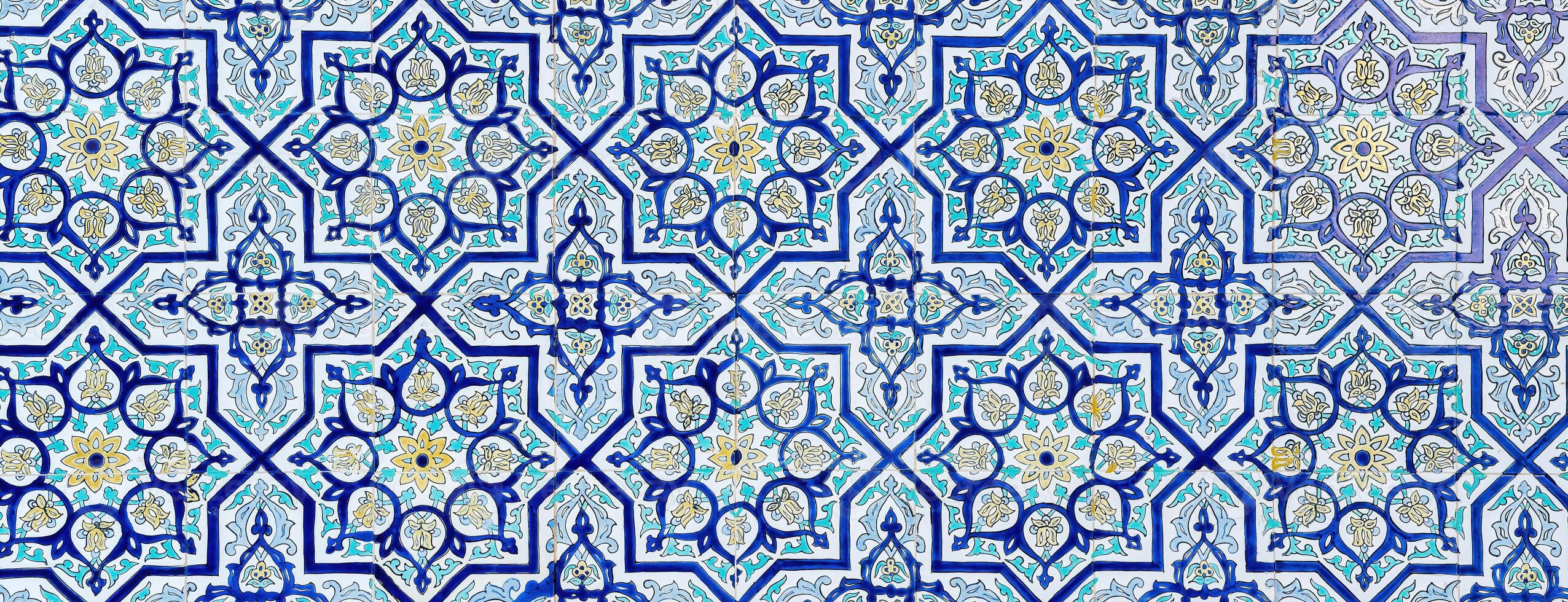 Geometric traditional Islamic ornament. Fragment of a ceramic mosaic. photo