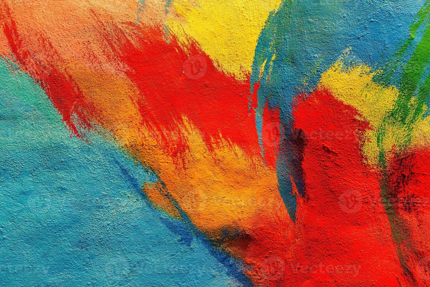 Colorful graffiti painted on a wall. Abstract urban background. Spray painting art. photo