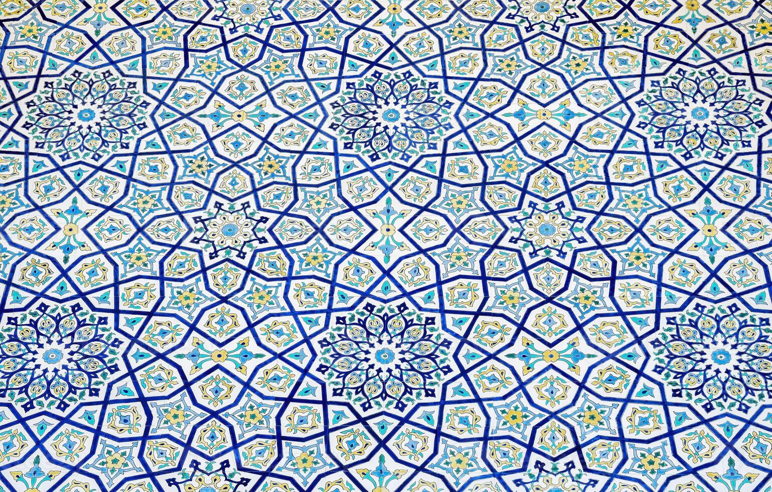 Geometric traditional Islamic ornament. Fragment of a ceramic mosaic. photo