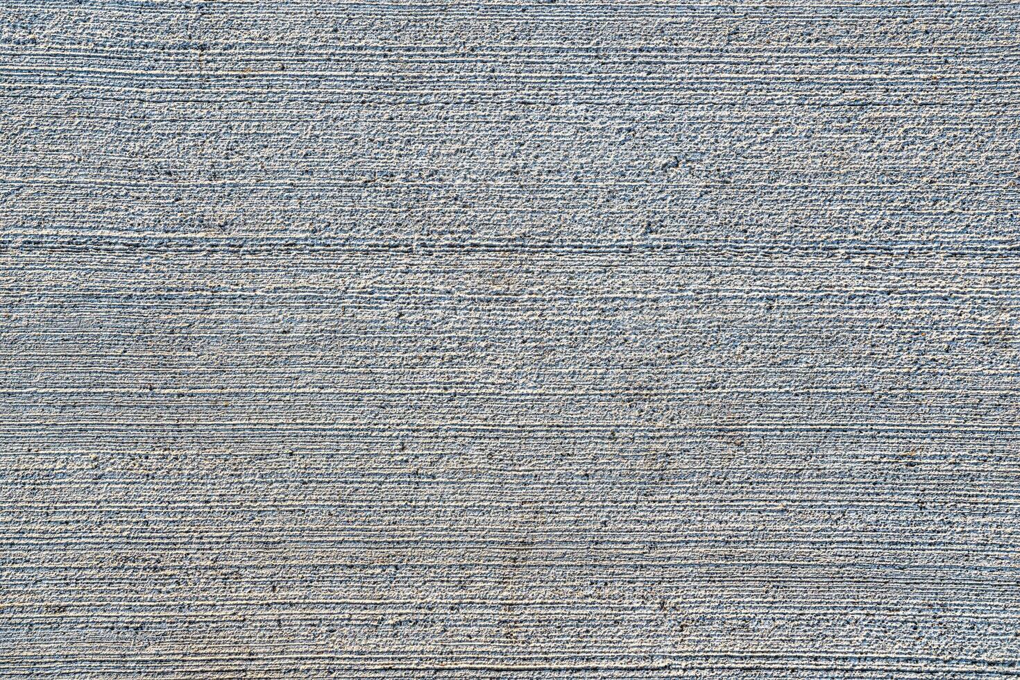Texture of gray scratched concrete. Abstract background. photo
