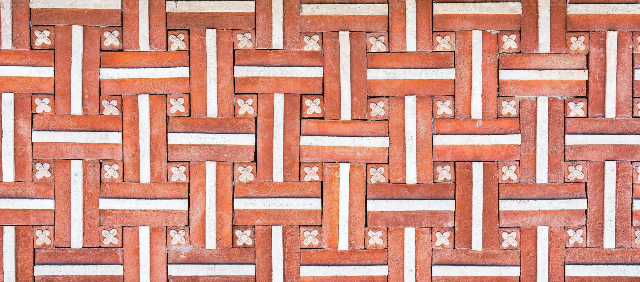 Texture of a decorative brick-like tiles. Abstract background for design. photo