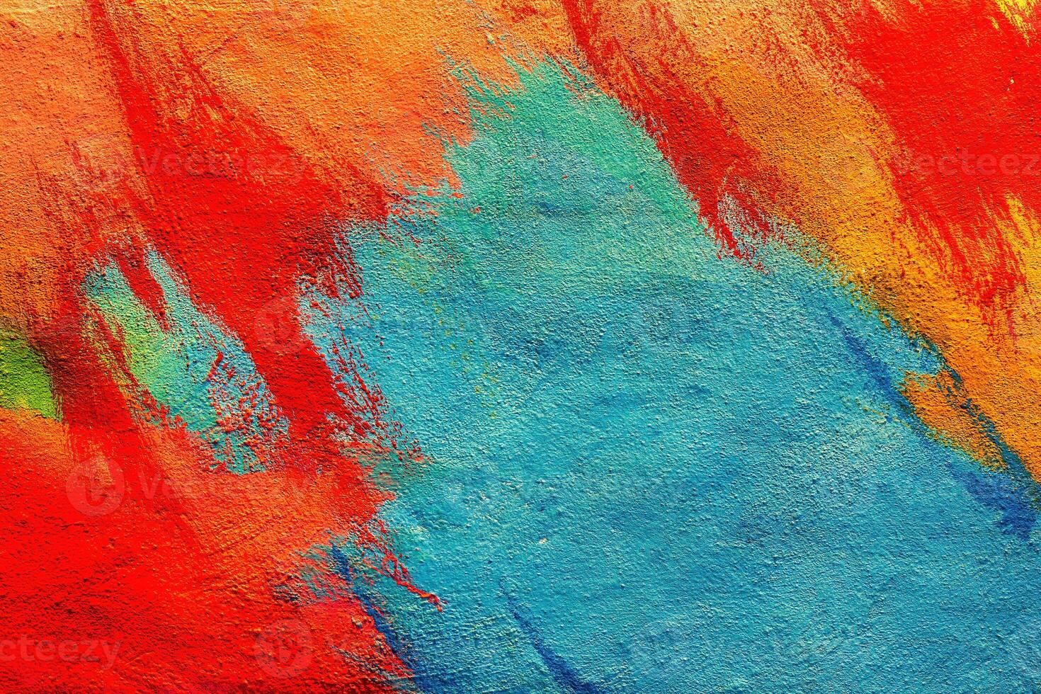 Colorful graffiti painted on a wall. Abstract urban background. Spray painting art. photo