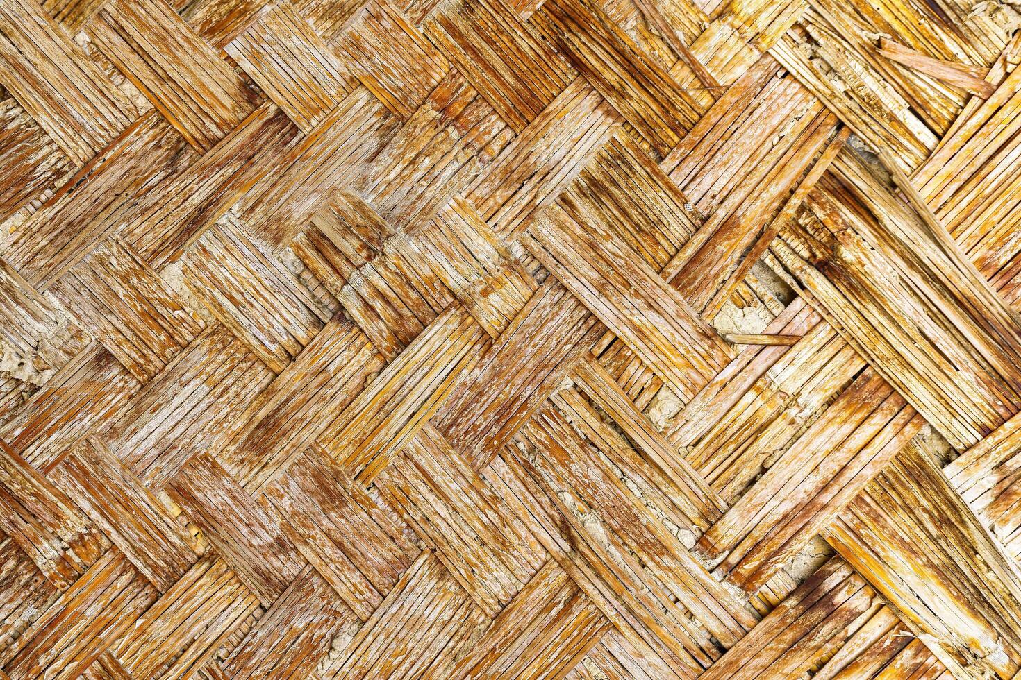 The texture of the frame of an oriental building made of woven bamboo. Abstract background. photo