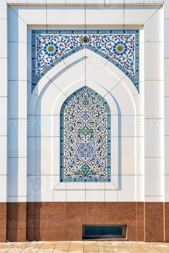 Geometric traditional Islamic ornament. Ceramic mosaic. photo