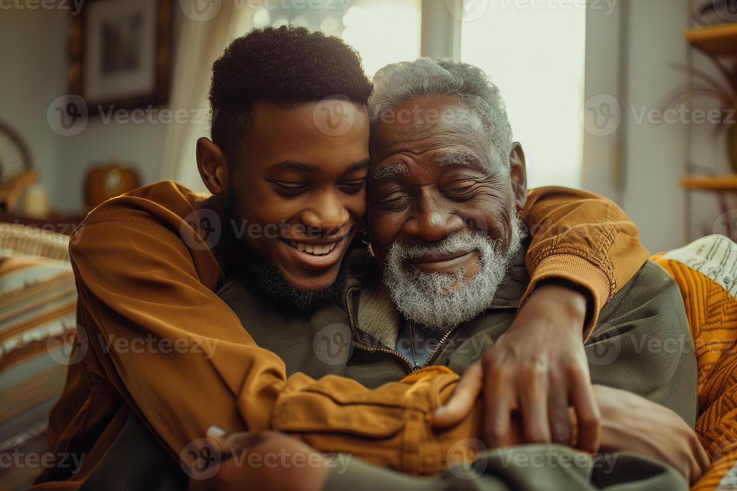 Smiling african american son hugging elderly father with beard. Two generations of men enjoy meeting on Father's Day. photo