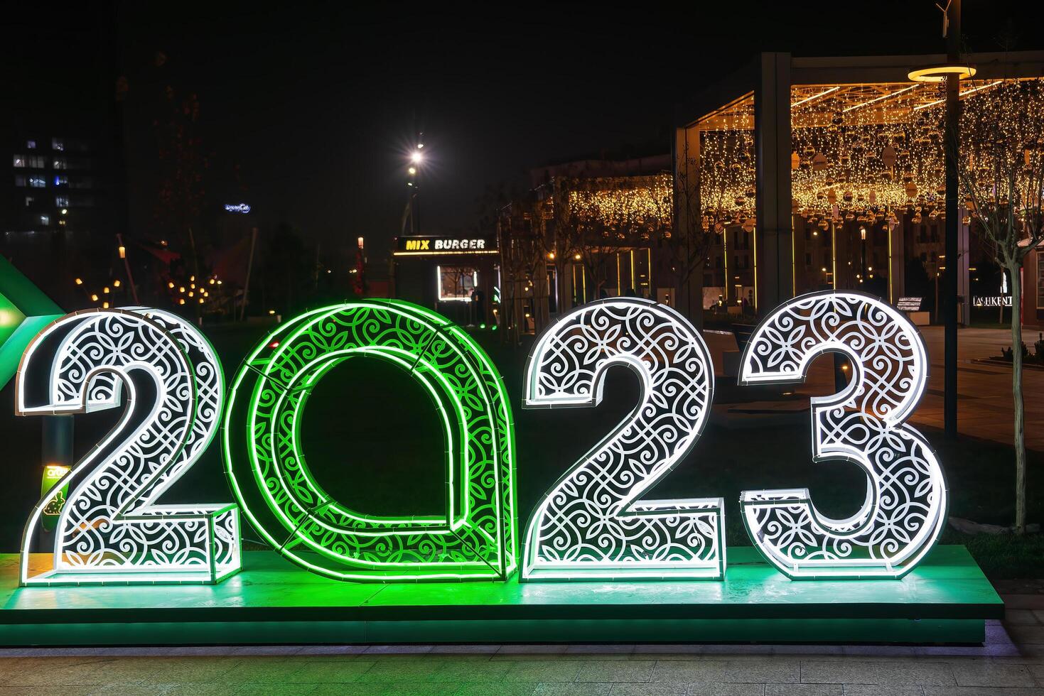 Uzbekistan, Tashkent - December 27, 2022 Christmas decoration in the form of the number 2023 from luminous garlands. photo