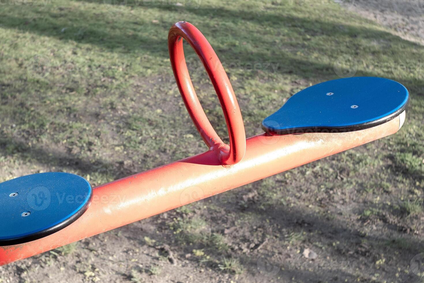 part of a swing on a playground photo