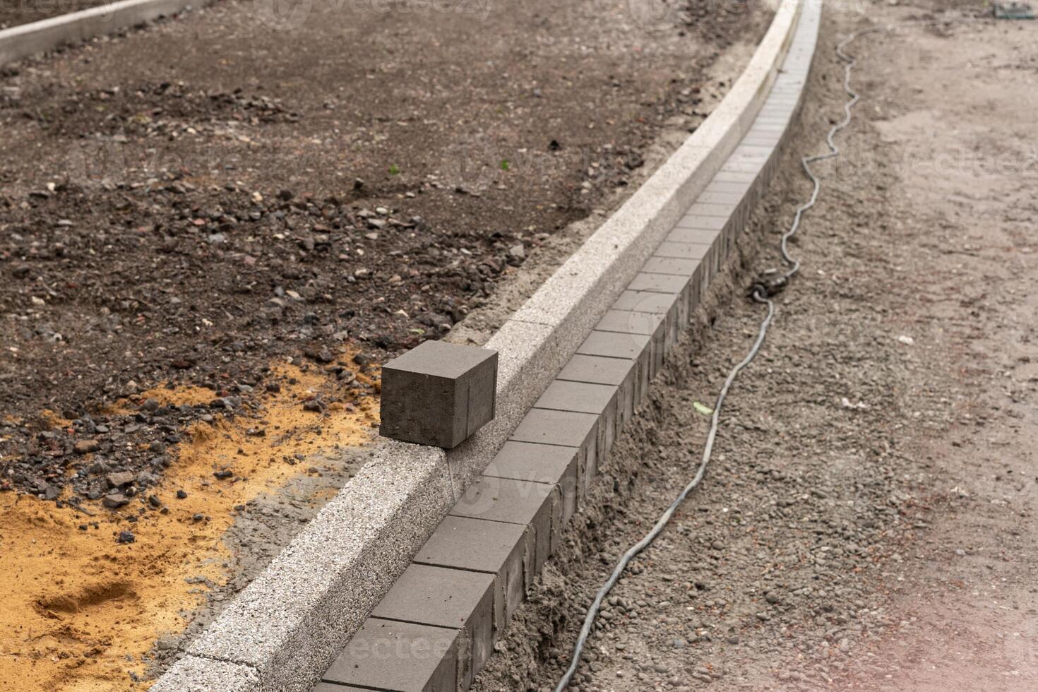 construction site, construction of a road and a sidewalk photo