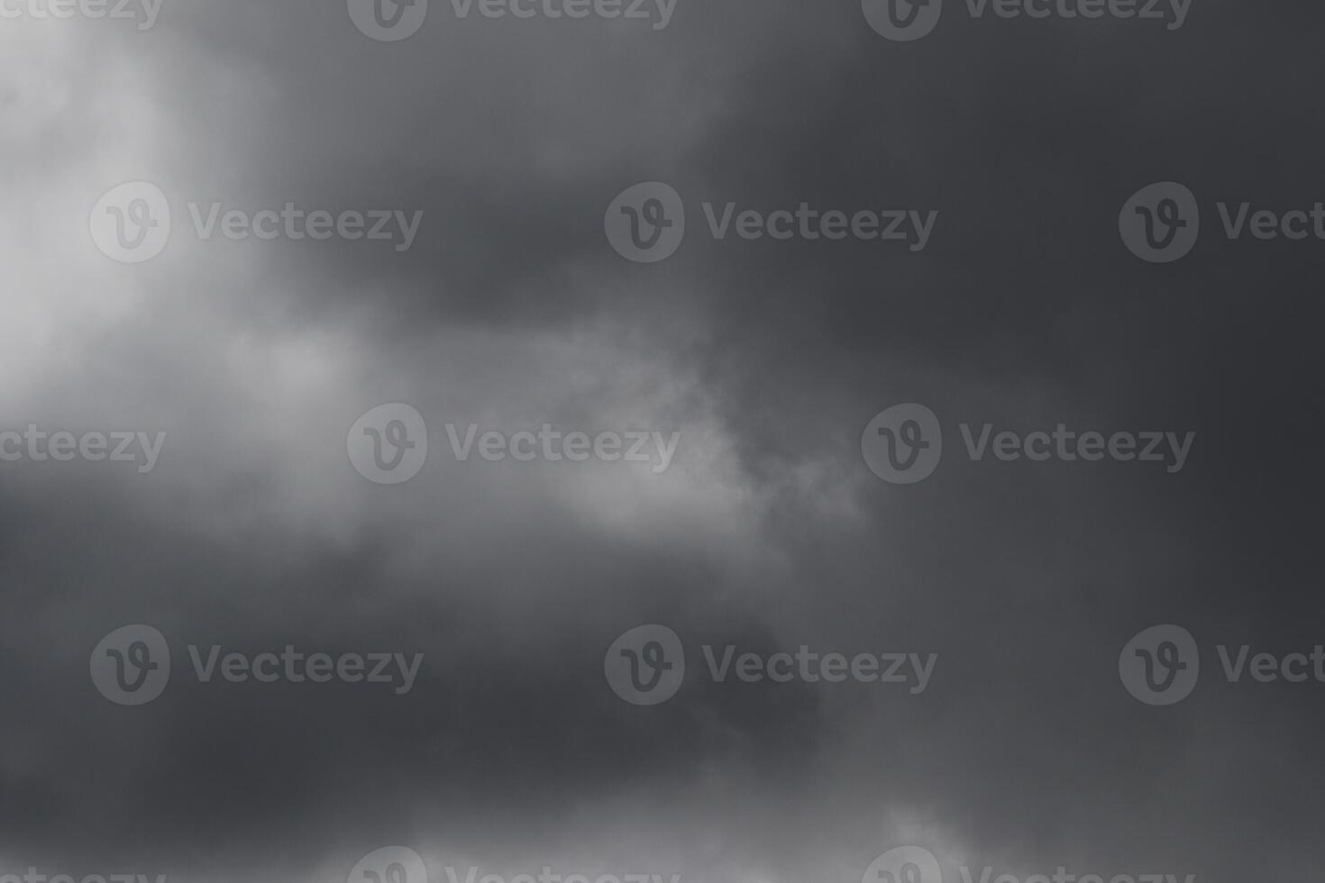 Cloudscape scenery, overcast weather above dark blue sky. Storm clouds floating in a rainy dull day with natural light. White and grey scenic environment background. Nature view. photo