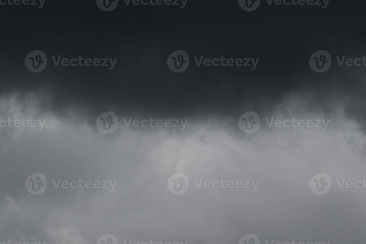 Cloudscape scenery, overcast weather above dark blue sky. Storm clouds floating in a rainy dull day with natural light. White and grey scenic environment background. Nature view. photo