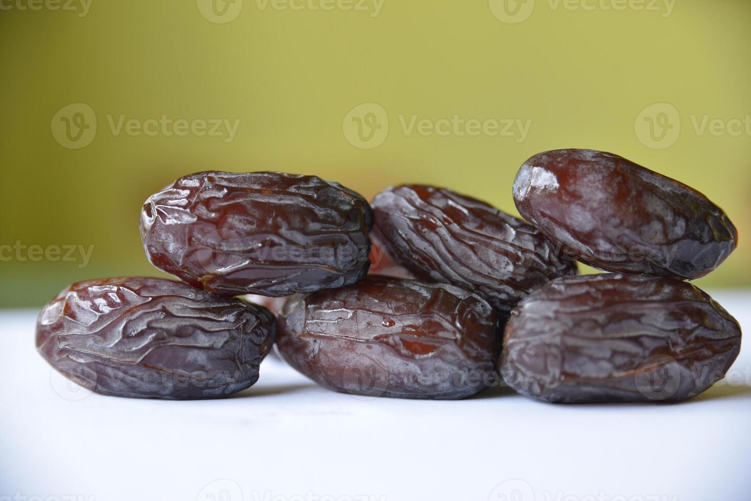 Close-up of organic gourmet Medjool date fruit at the market. View from above. photo