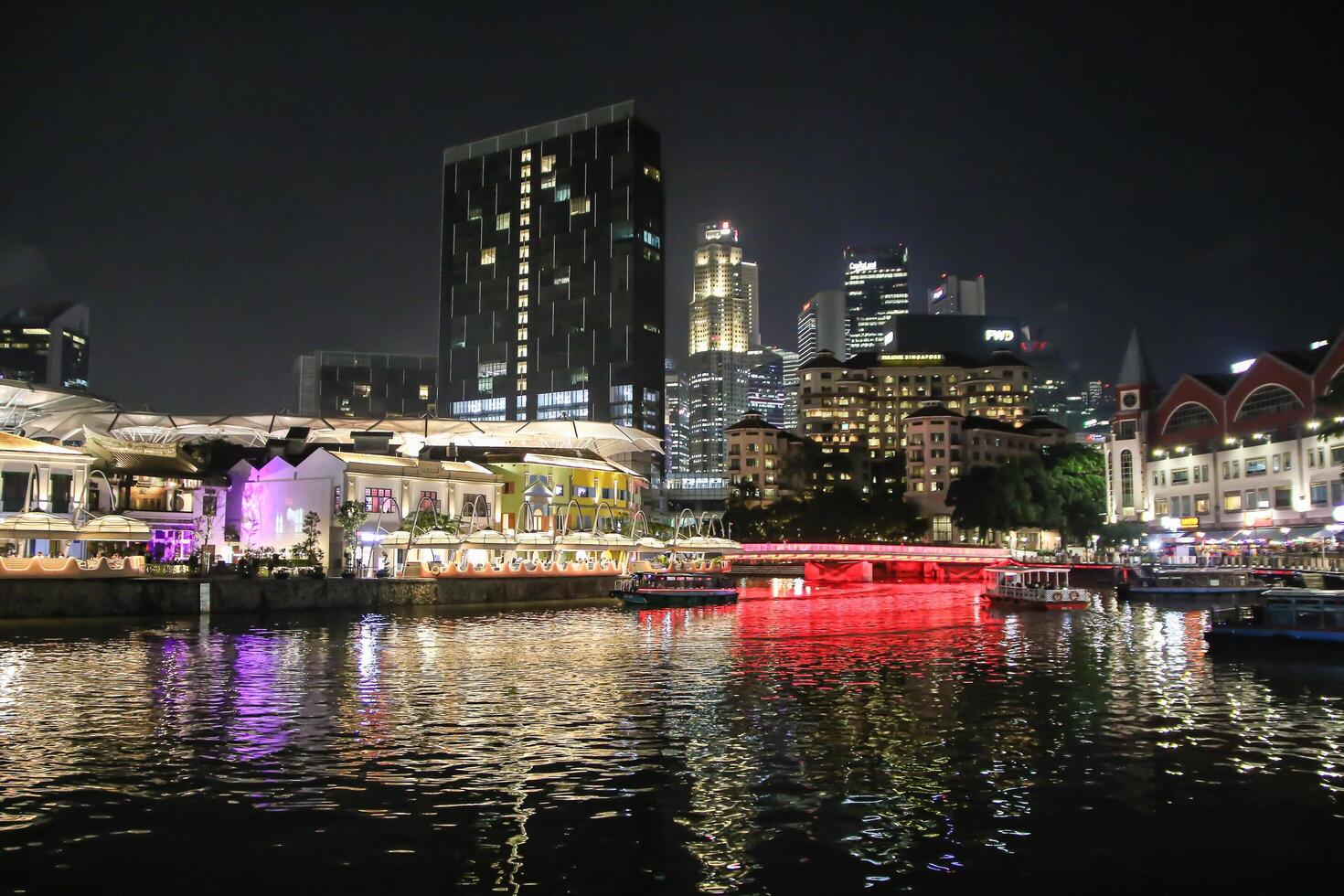 Singapore, 2024 - Colorful of Clarke Quay in downtown Singapore at night photo