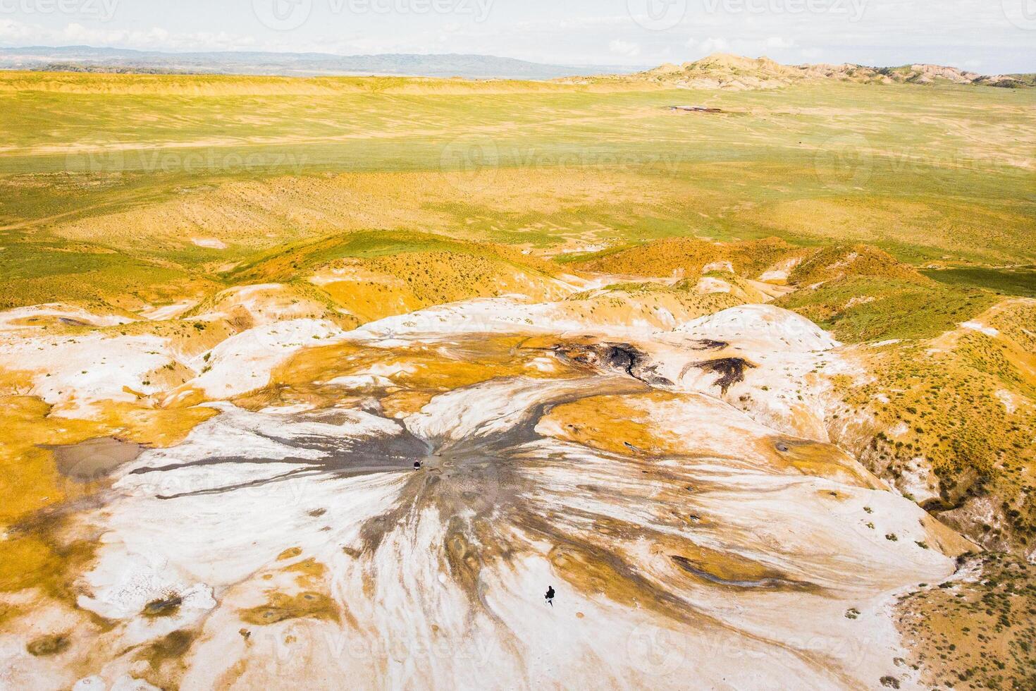 Top down aerial view scenic natural mud volcanoes formations in Chachuna nature reserve, Georgia. Dali mount reservoir in Chachuna managed reserve, Georgia photo