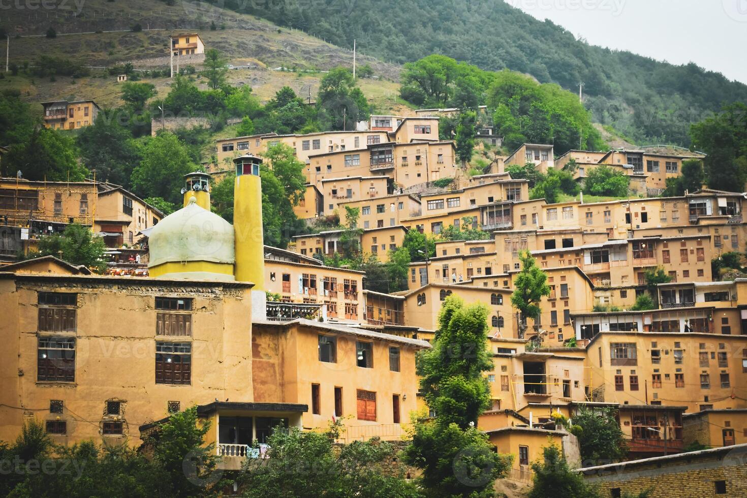 Historical city of Masouleh, Iran. Unesco world heritage site in north east. Little unique mosque in Masouleh mountain village with minarets photo