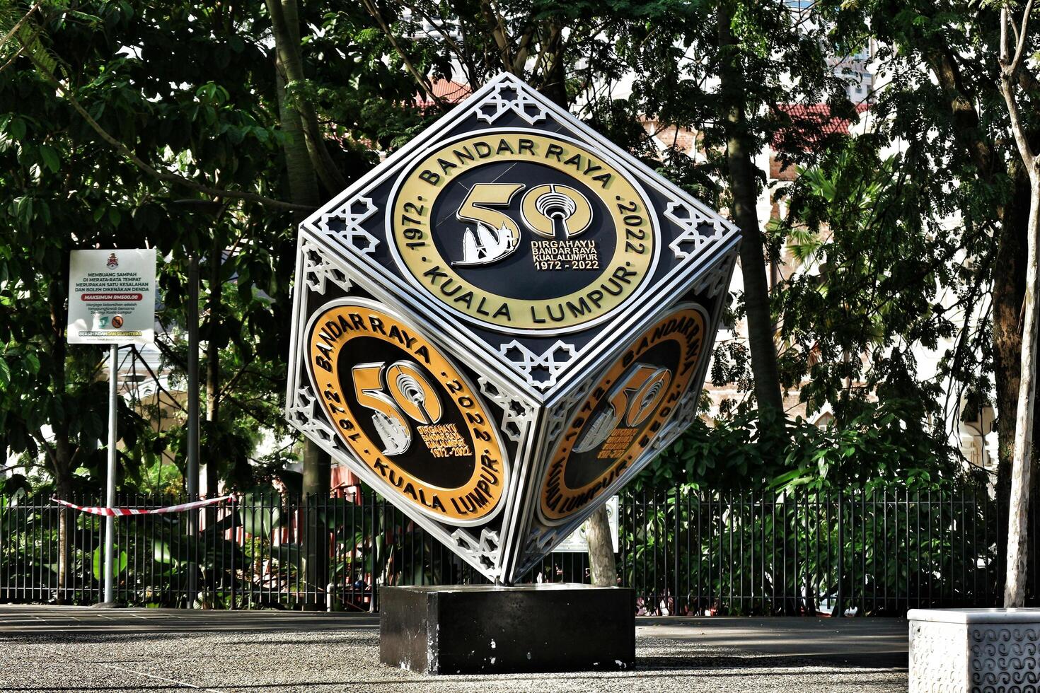 Kuala Lumpur, Malaysia on May 21 2023. A cube-shaped monument to commemorate Dirgahayu Bandar Raya Kuala Lumpur 1972 - 2022. Located in city center photo