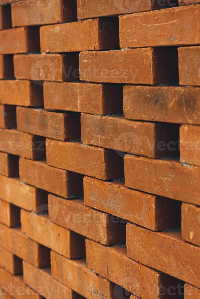 The arrangement of the bricks arranged in such a way forms a very beautiful building wall photo
