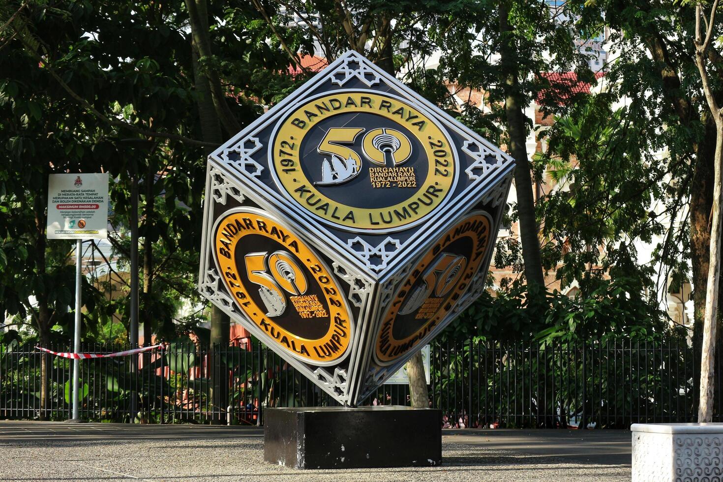 Kuala Lumpur, Malaysia on May 21 2023. A cube-shaped monument to commemorate Dirgahayu Bandar Raya Kuala Lumpur 1972 - 2022. Located in city center photo