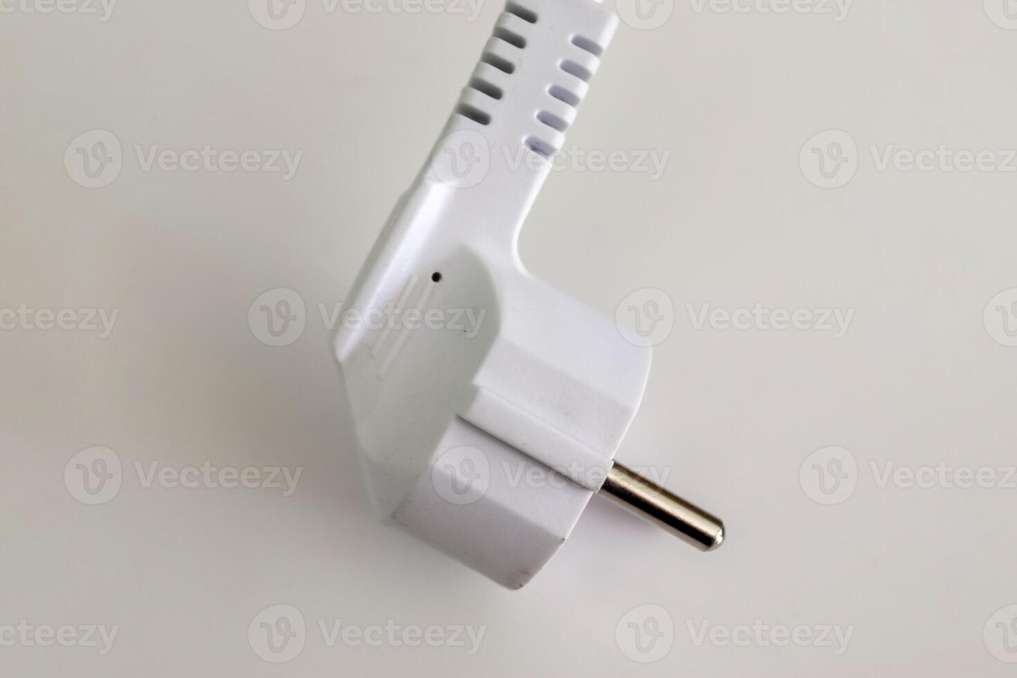 Isolated electrical black and white european plugs on a white background photo