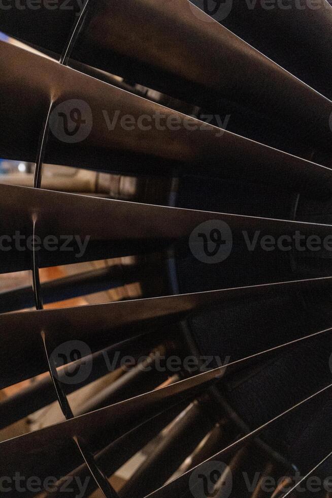 Metal blades. Aircraft turbine detail photo