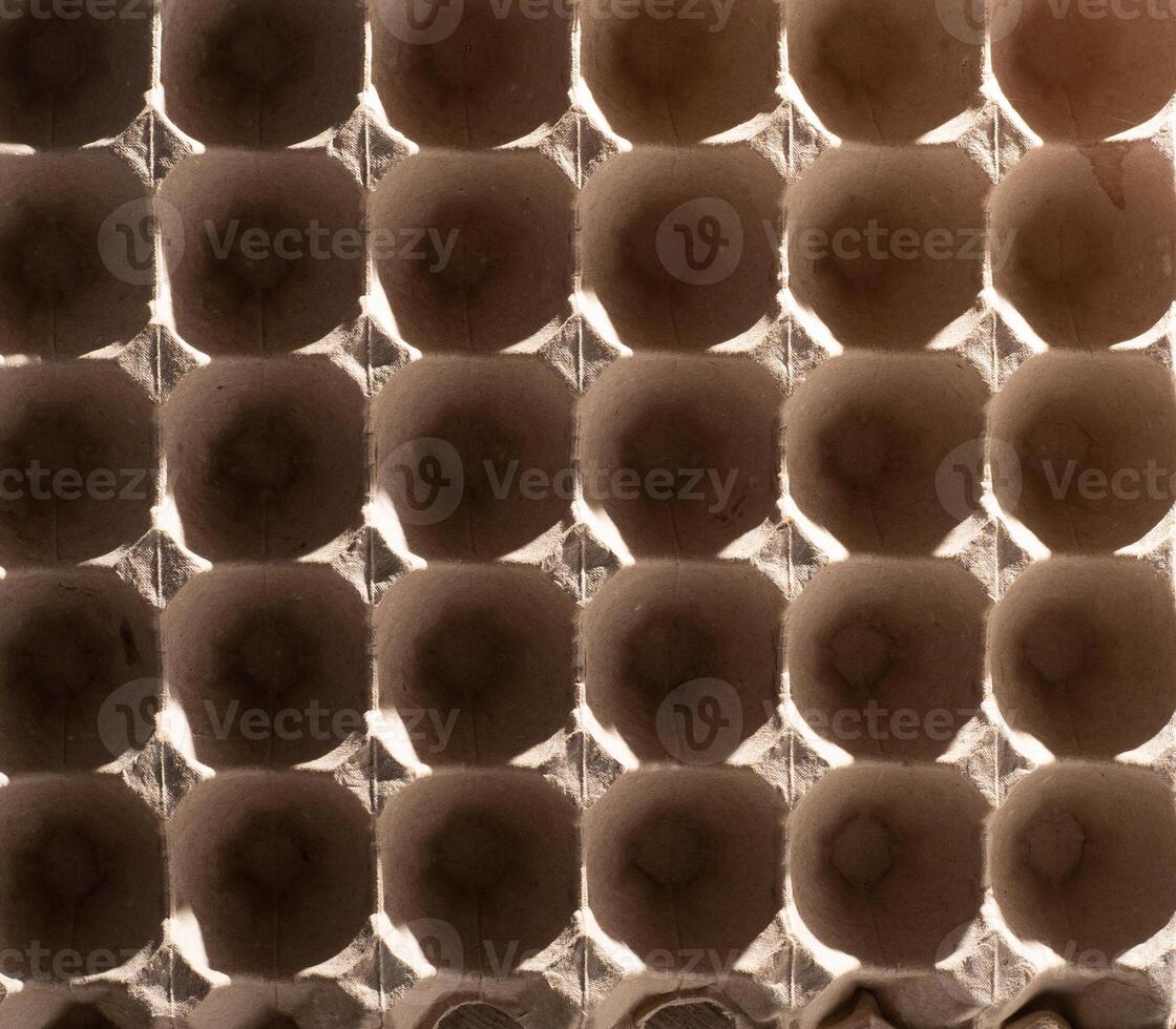 Abstract background. frame geometry. Egg packaging. Paper tray for domestic eggs. Beige and grey. Minimalism. photo