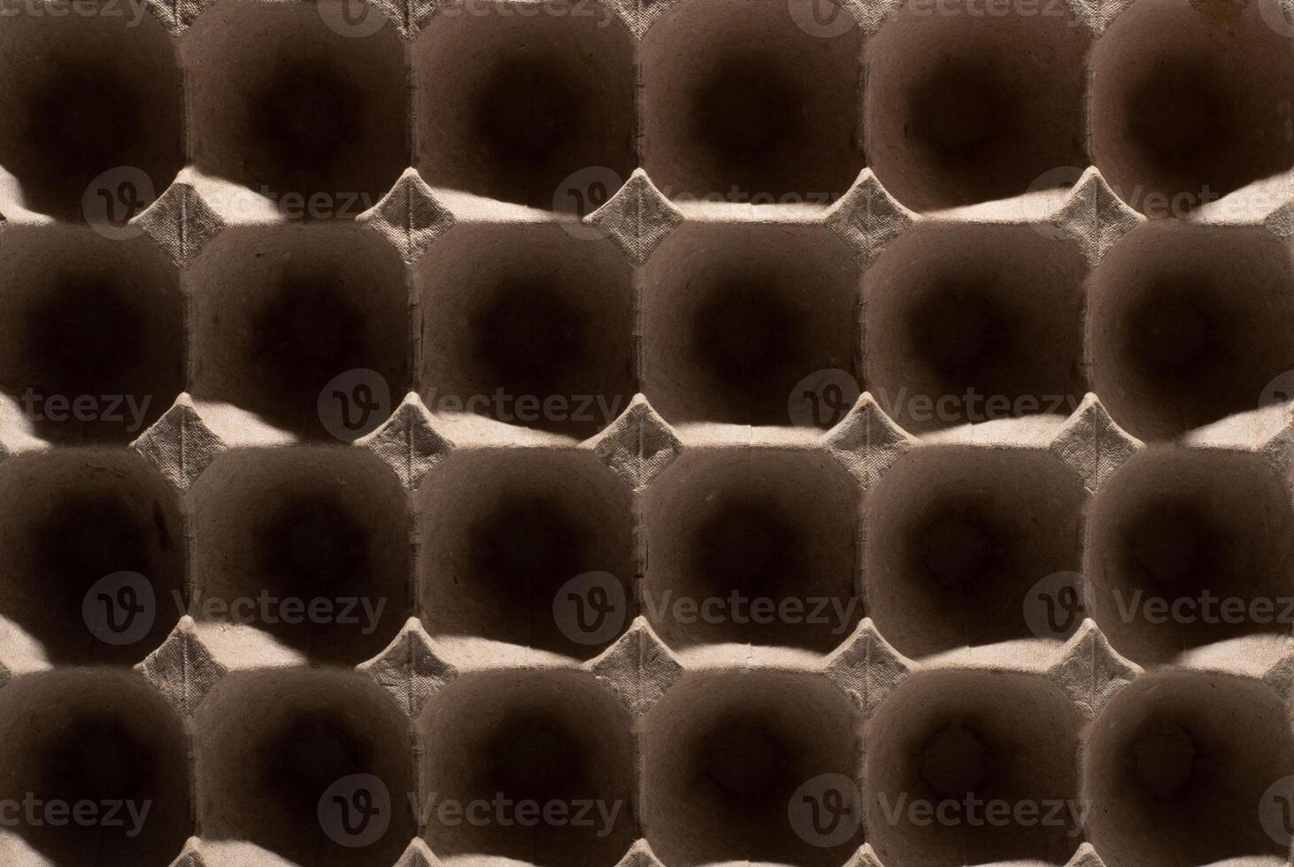 Abstract background. frame geometry. Egg packaging. Paper tray for domestic eggs. Beige and grey. Minimalism. photo