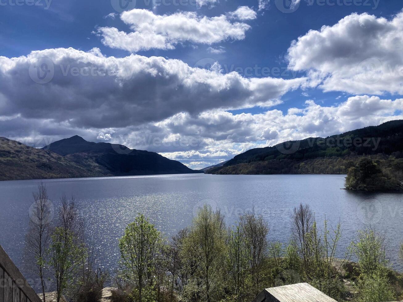 A view of Loch Lomond in Scotland on a sunny day photo