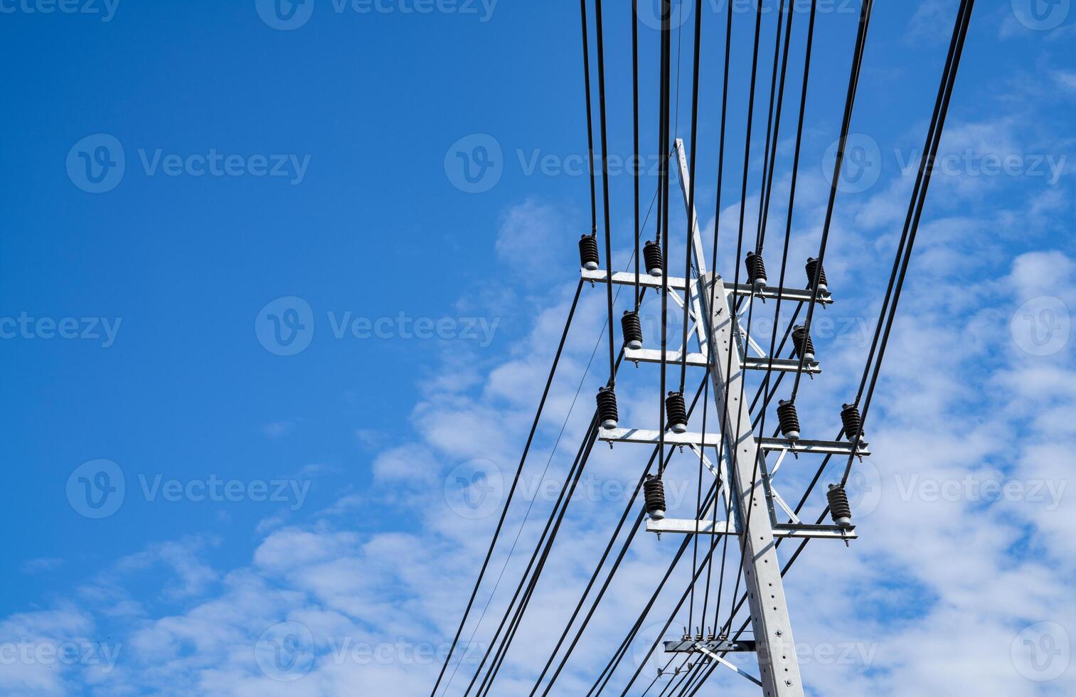 Electricity transmission pylon. Transmission tower collect electricity from wind turbines for sustainable energy. Clean power. Renewable energy infrastructure. Electricity high-voltage lines. photo