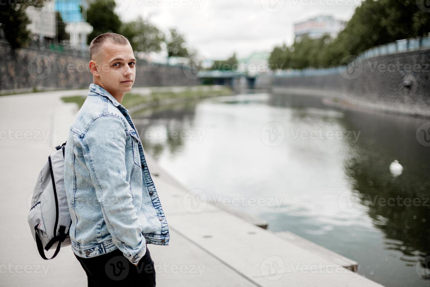 A man wearing a blue jacket photo