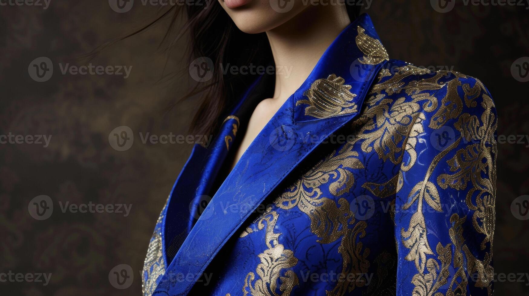 un estructurado chaqueta de sport en un real azul matiz presentando intrincado oro brocado y un alta baja dobladillo Perfecto para un moderno duquesa asistiendo un estado cena foto