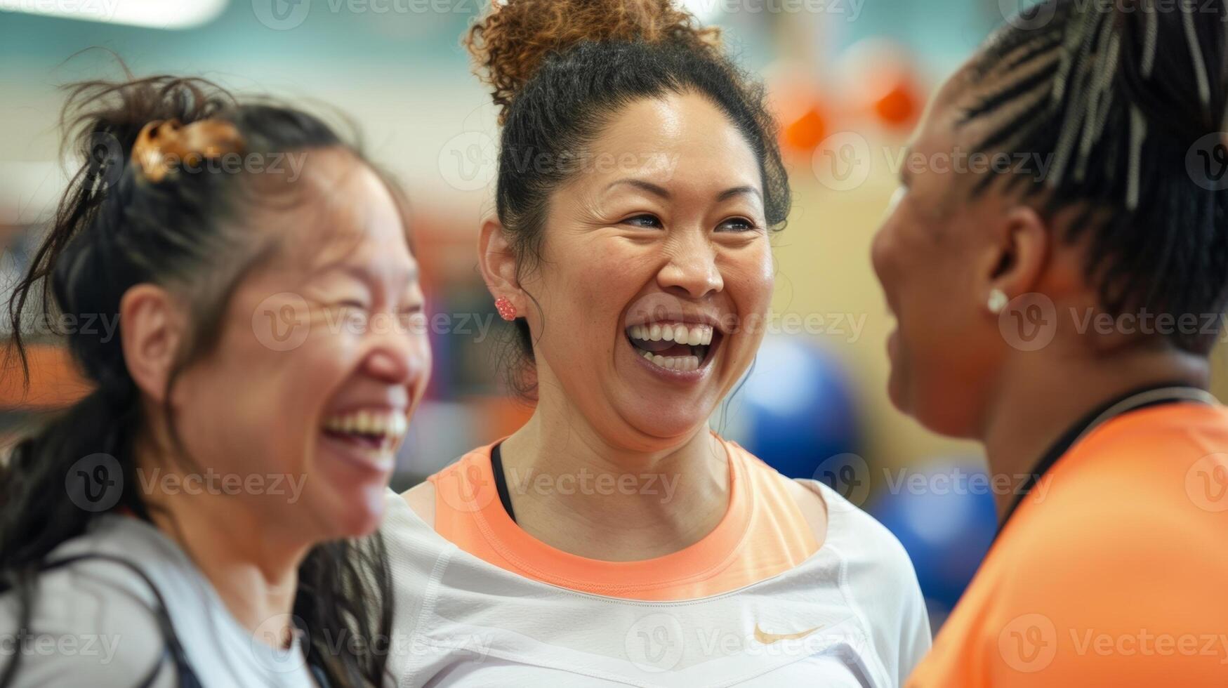 A sense of calm and camaraderie fills the air as they chat and laugh the stresses of the workout fading away. photo