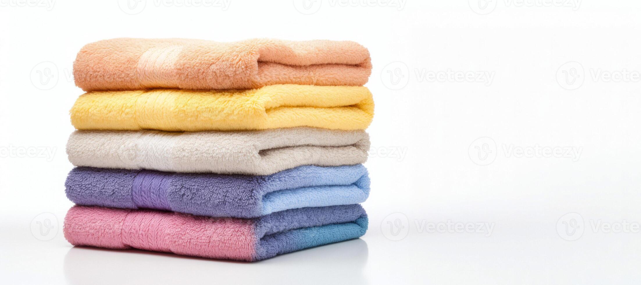 AI generated multi-colored towels on a white background Generative AI photo