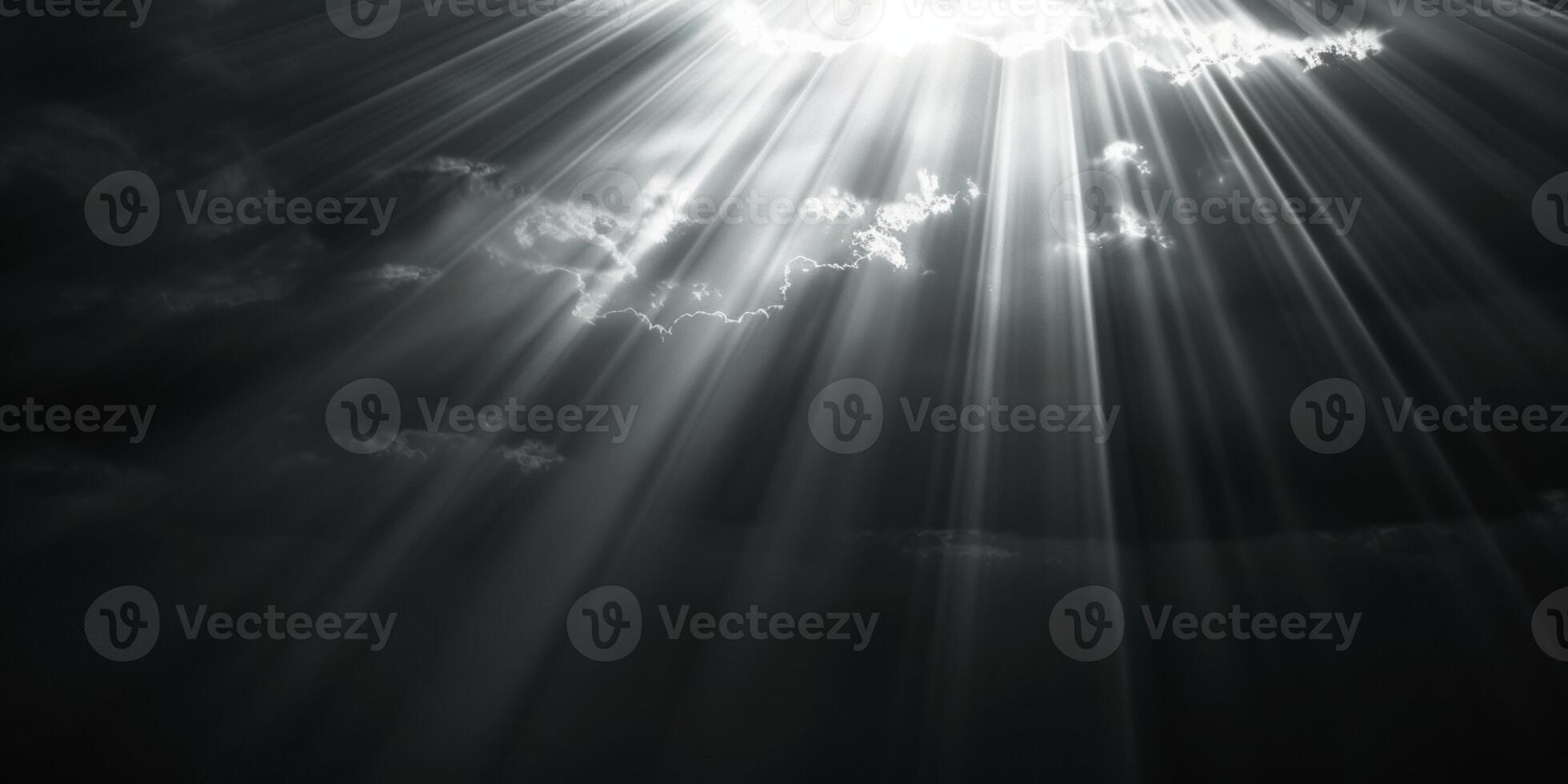 bright rays of light break through the clouds photo