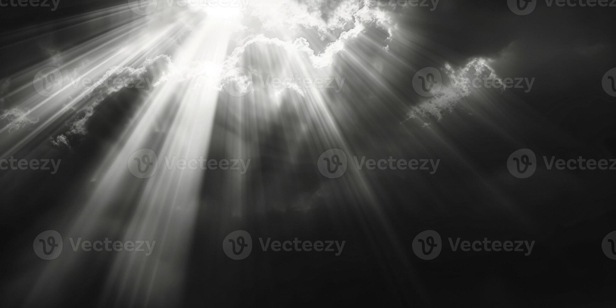 bright rays of light break through the clouds photo