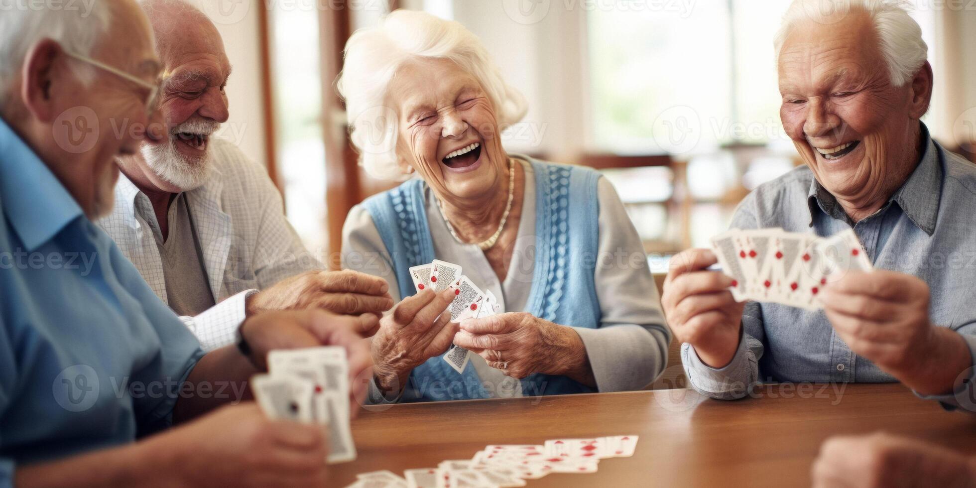 elderly people playing cards in a nursing home photo