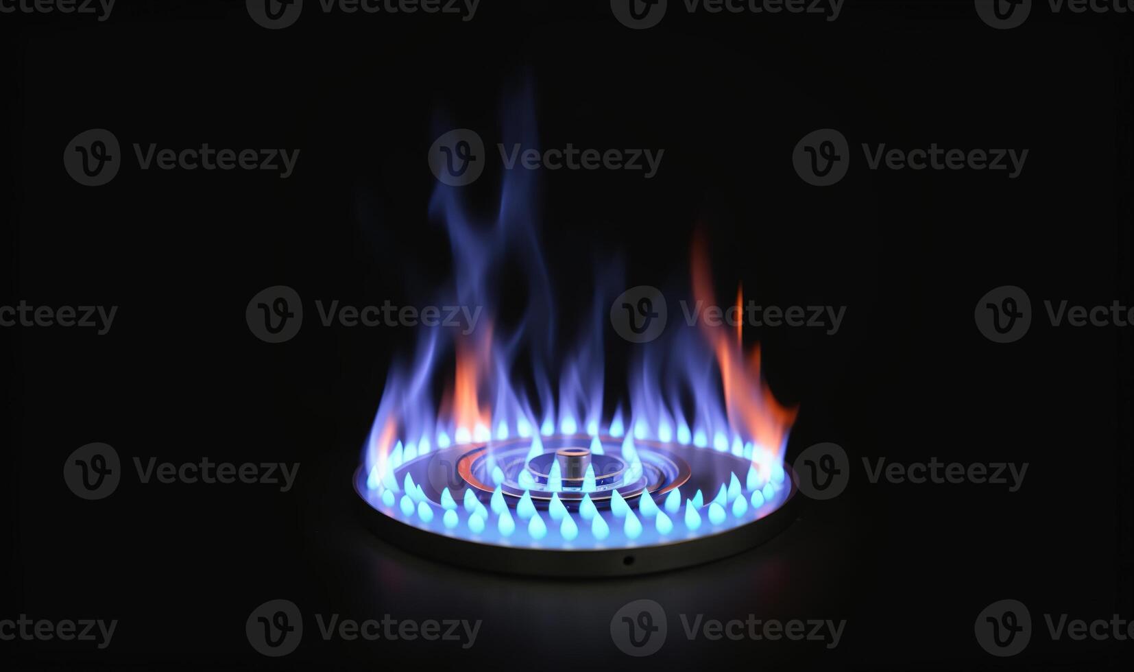 blue flame of a gas burner on a black background photo