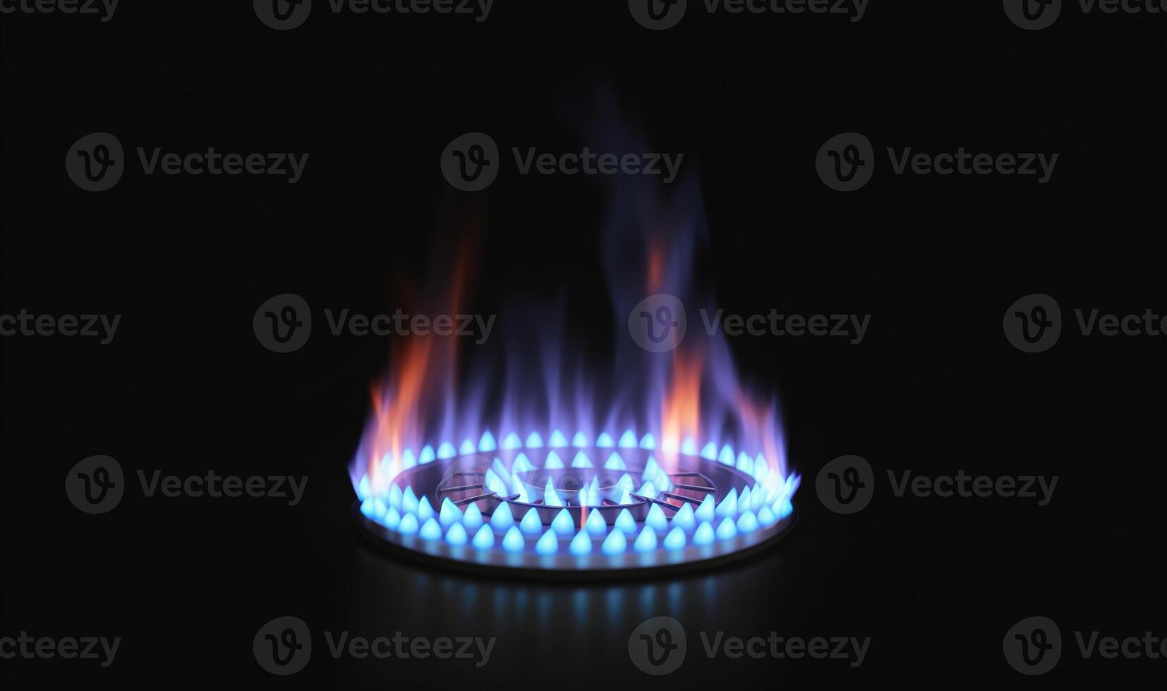blue flame of a gas burner on a black background photo