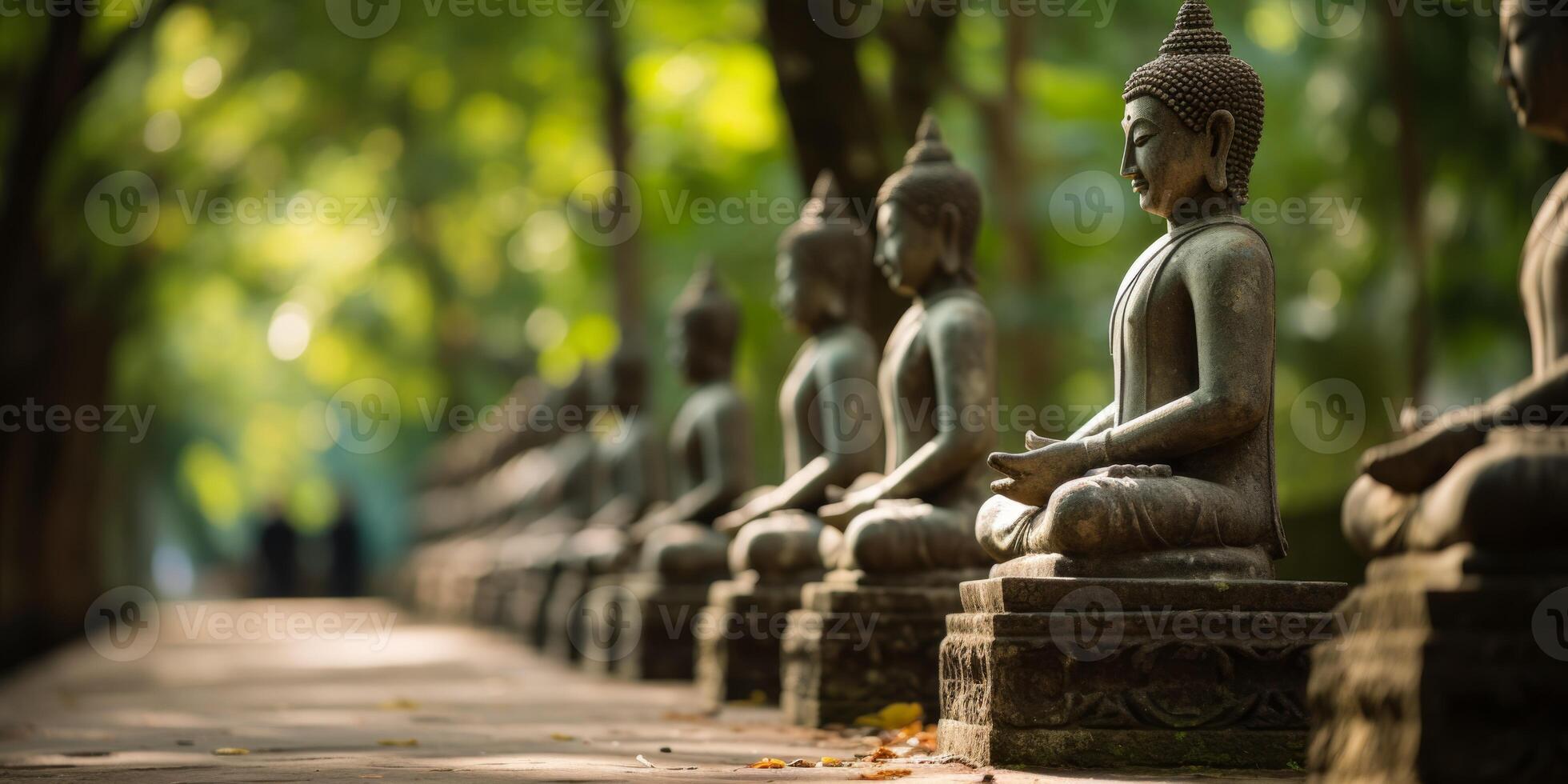 Buddha statues in the forest photo