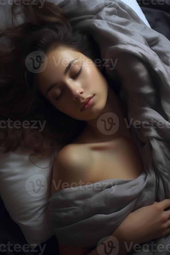 woman sleeping in bed photo