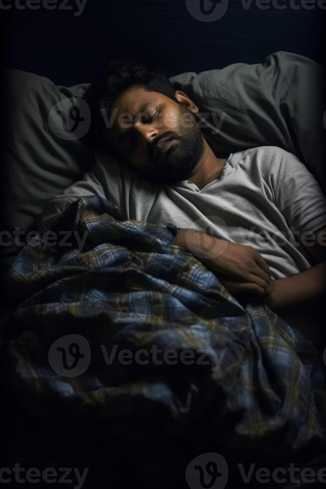 man sleeping peacefully in bed photo