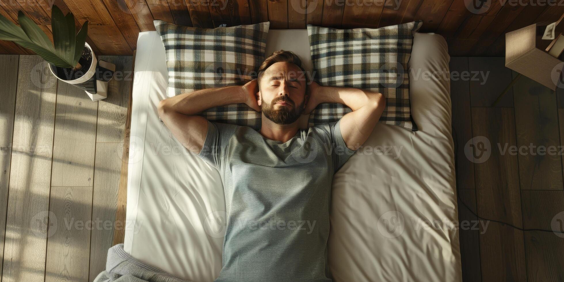 man sleeping in bed photo
