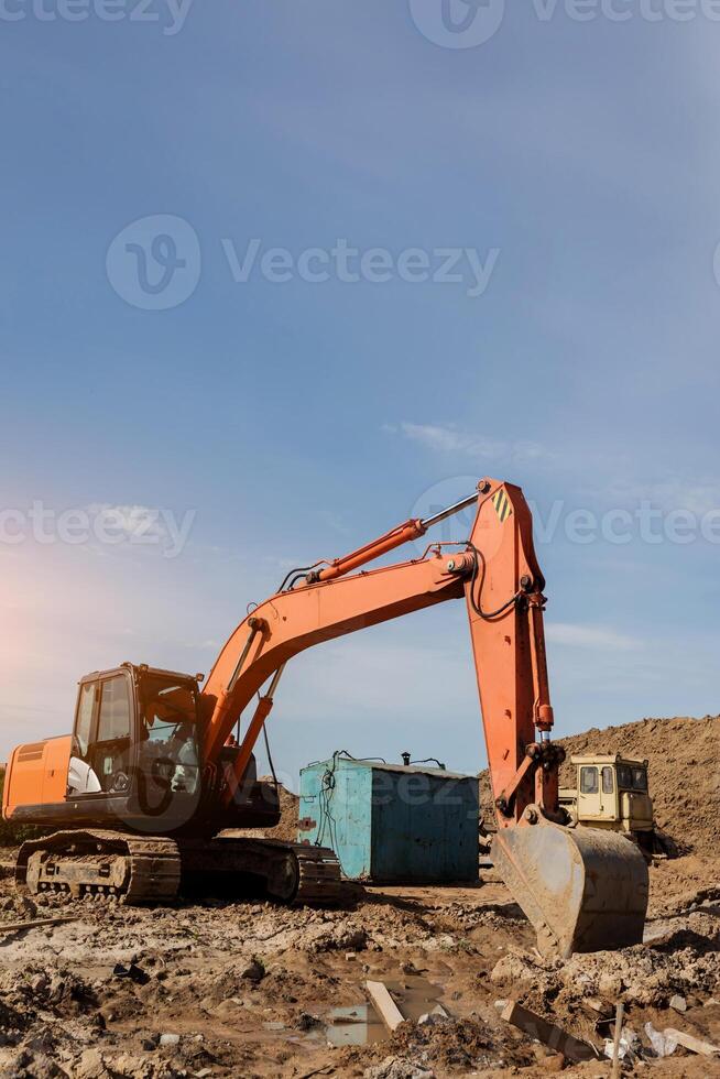 excavador trabajando a construcción sitio foto